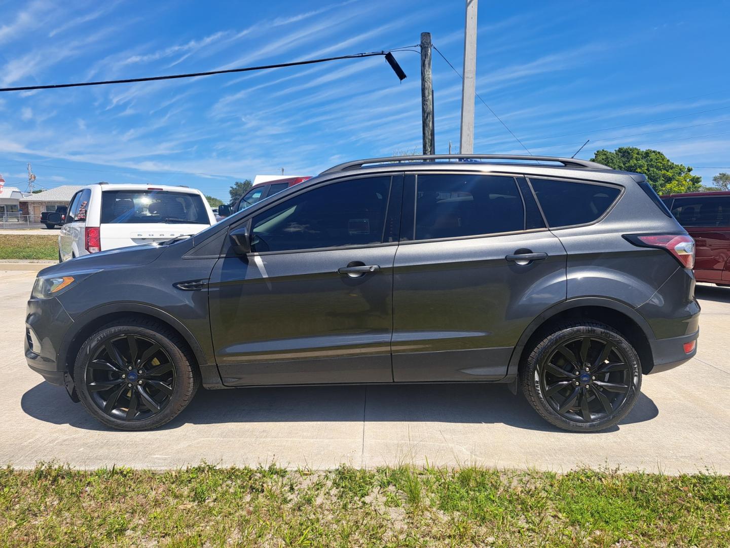 2017 Grey /GRAY Ford Escape (1FMCU0GD8HU) , located at 1181 Aurora Rd, Melbourne, FL, 32935, (321) 241-1100, 28.132914, -80.639175 - Photo#0